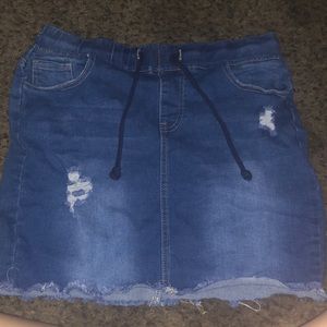 A blue jean skirt